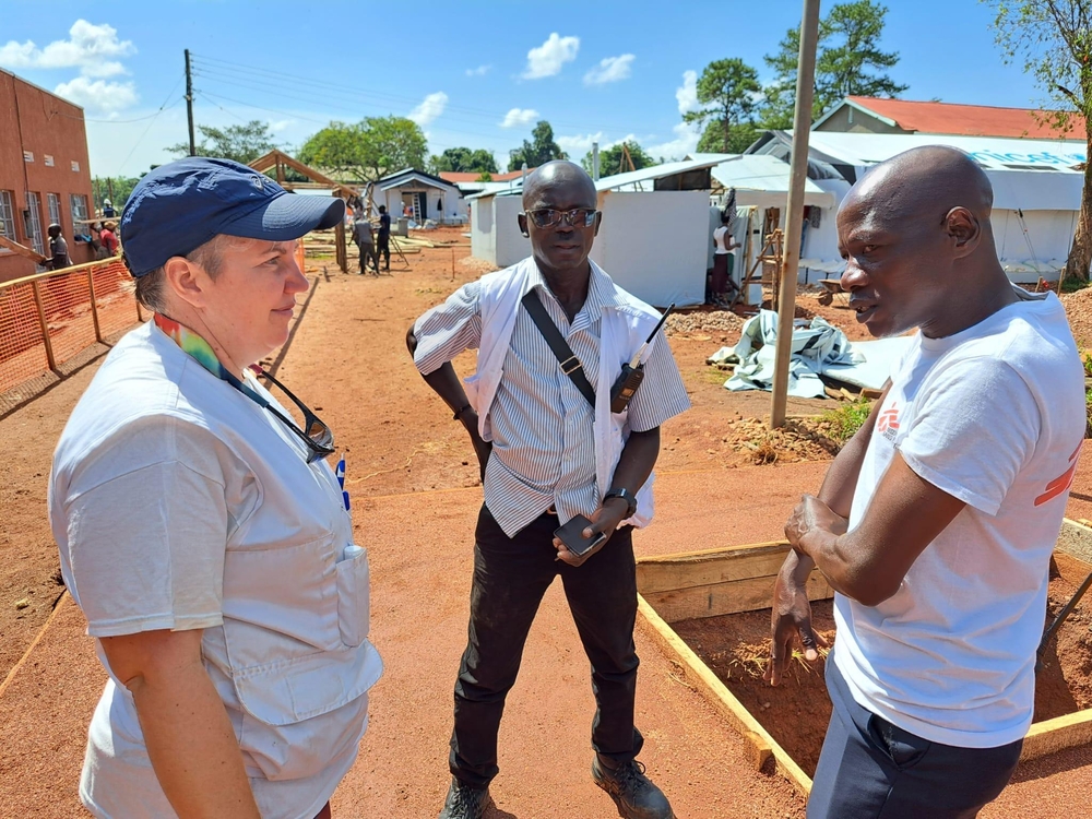 msb140387_medium.jpg MSF staff discuss the plans for a 39-bed Ebola Treatment Centre in Mubende