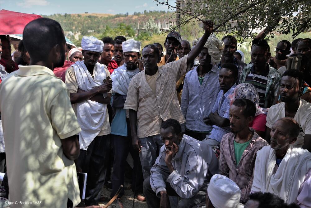 msb63812_medium.jpeg A group of displaced people engage in a discussion at Abdimalaha school in the city of Adwa, in central Tigray.