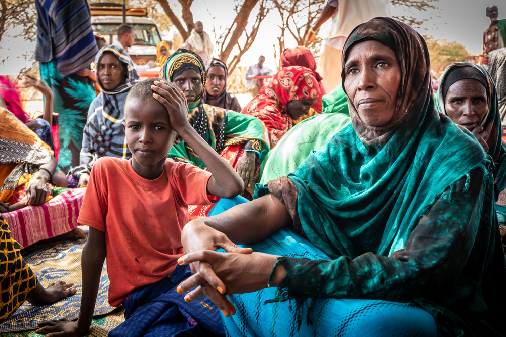Muhabba and her son at the MSF mobile clinic. [ © Susanne Doettling/MSF ]