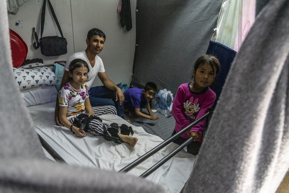 Fatima's family of 6 live in a 4m2 space in a part of a container in Moria. [© Anna Pantelia/MSF]