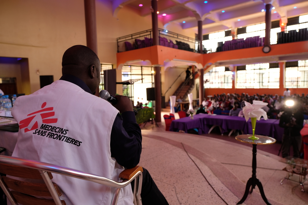 At a youth forum in Beni’s city center, MSF project medical referent Jean Pierre Kaposo explains the Ebola vaccination campaign, prevention and treatments to young community leaders. [ © MSF/Samuel Sieber]