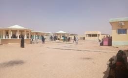 People walk around the compound of a hospital in Tiné. Chad, March 2026.