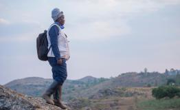 Jeanine Arakaza is looking at the Ruyaga hill where teams where dispatched to treat houses against mosquitoes