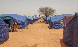Site 2 for the displaced in Pissila: there are insufficient latrines and household items are exposed to the weather.