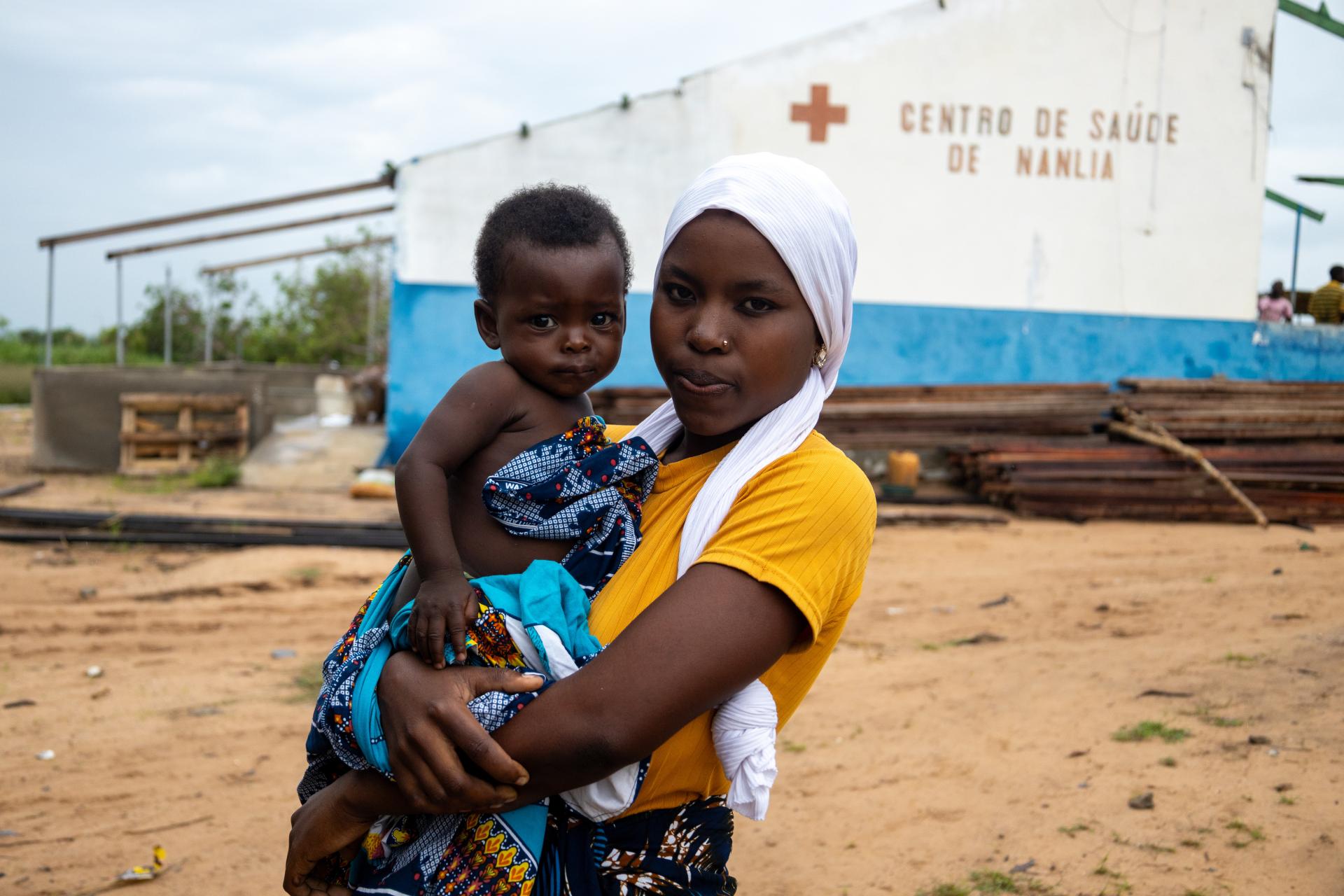 Marcia, a resident of Nanlia community, visited the health center for a medical follow-up for her daughter. Nanlia Health Center serves a population of 61,180, including many displaced by the conflict.