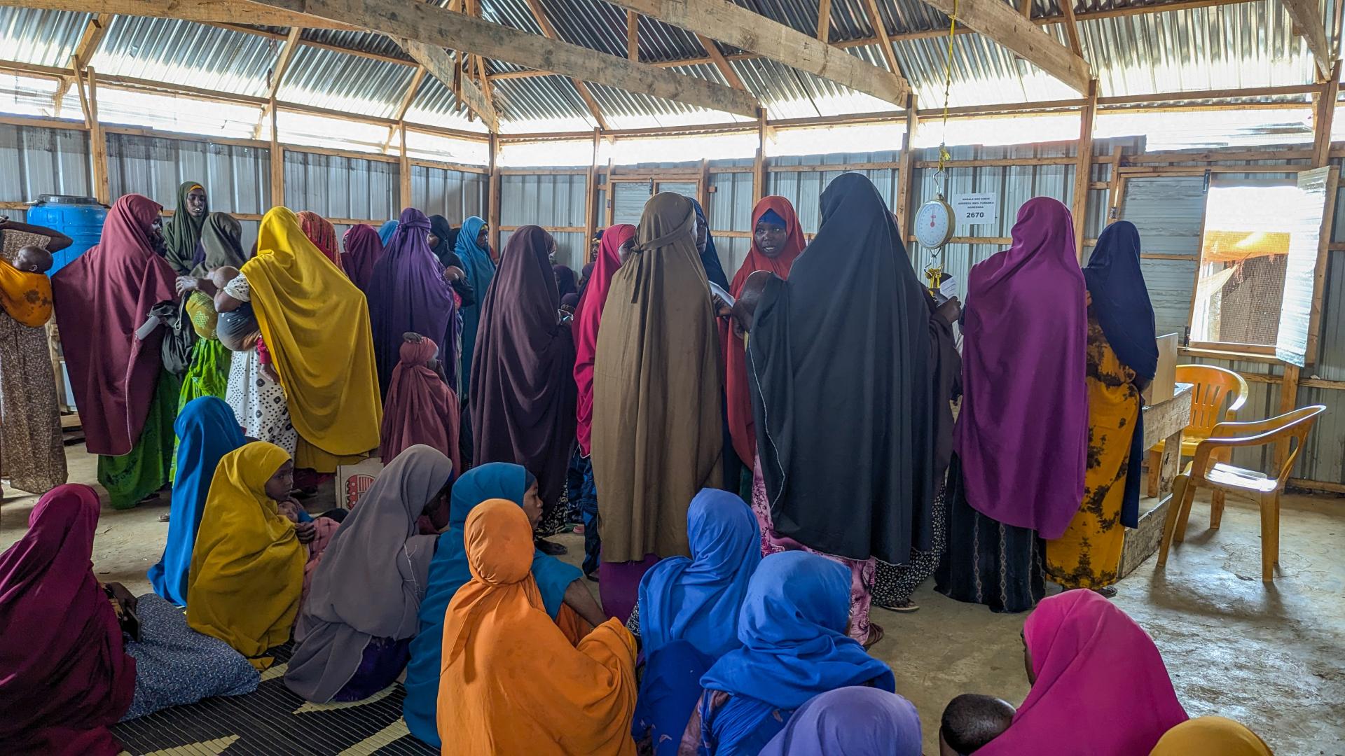 Patients wait to be seen at MSF’s Elbeti 1 health post in Elbeti IDP camp, Baidoa, Southwest State, Somalia. MSF runs seven health posts across IDP camps in Baidoa, providing primary healthcare including screening and treatment for acute malnutrition.