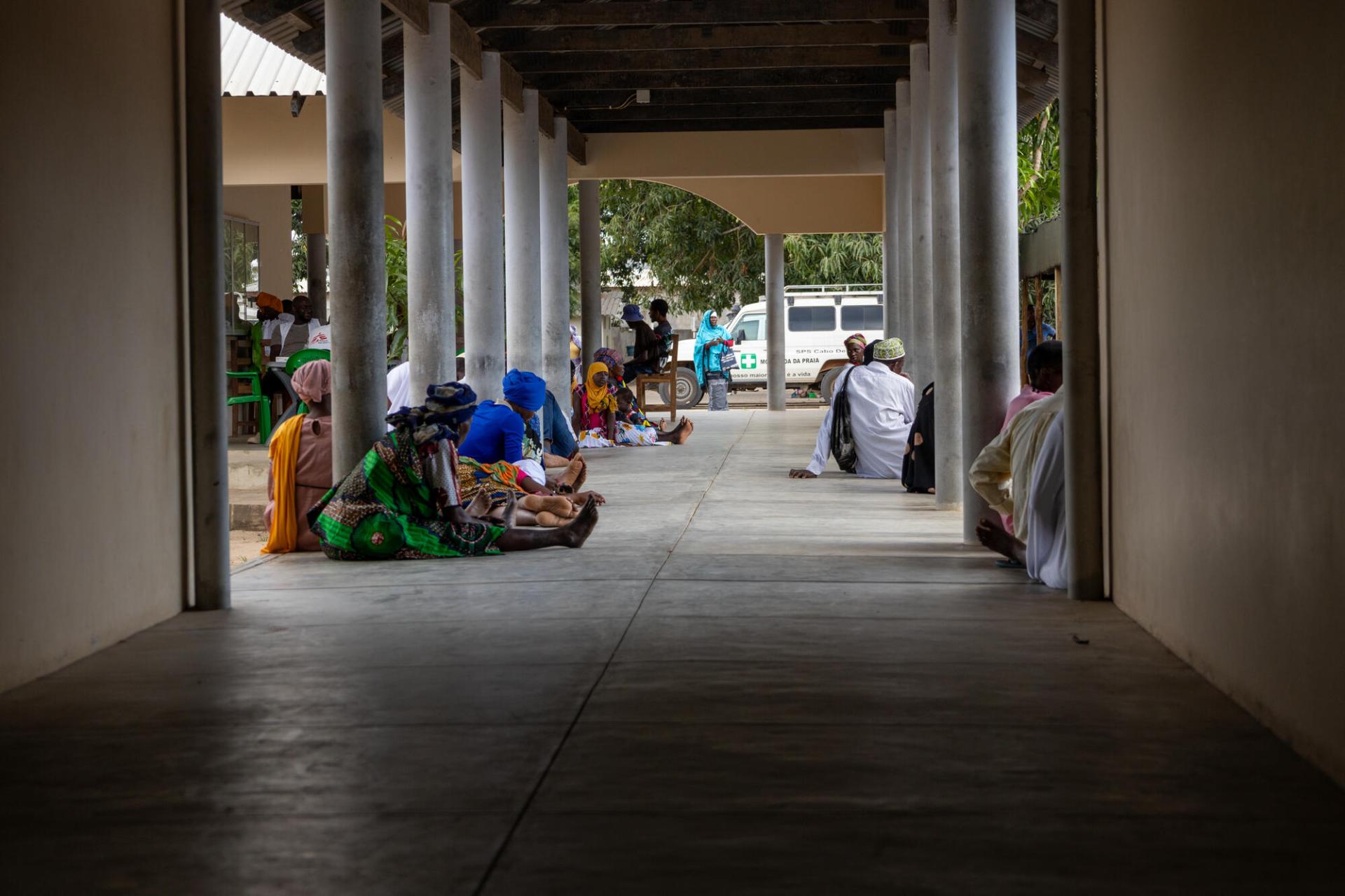Patients wait at a corridor of the Rural hospital in Mocímboa da Praia, in Cabo Delgado. Mozambique, October 2024.