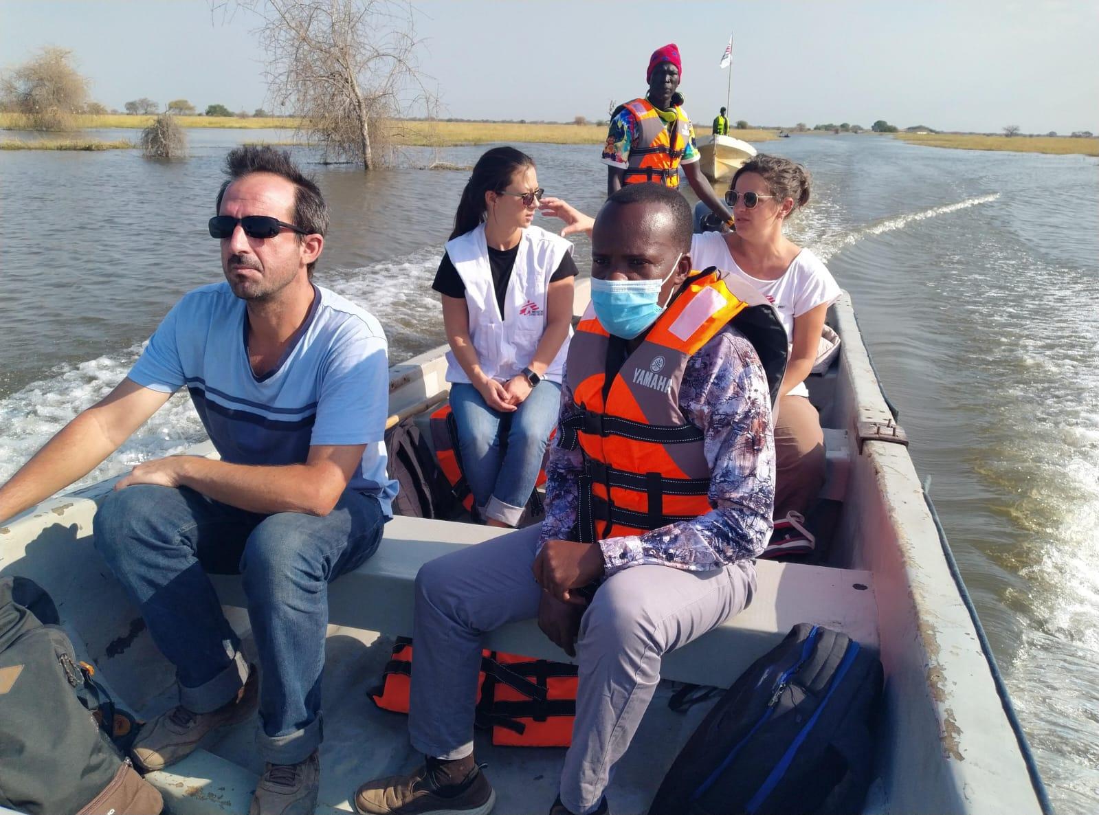 Wading the flood waters, enduring bees attack to deliver medical services in Jonglei