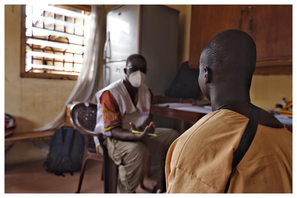 in Makeni Correctional Centre in Sierra Leone during a screening session for TB with an inmate in th
