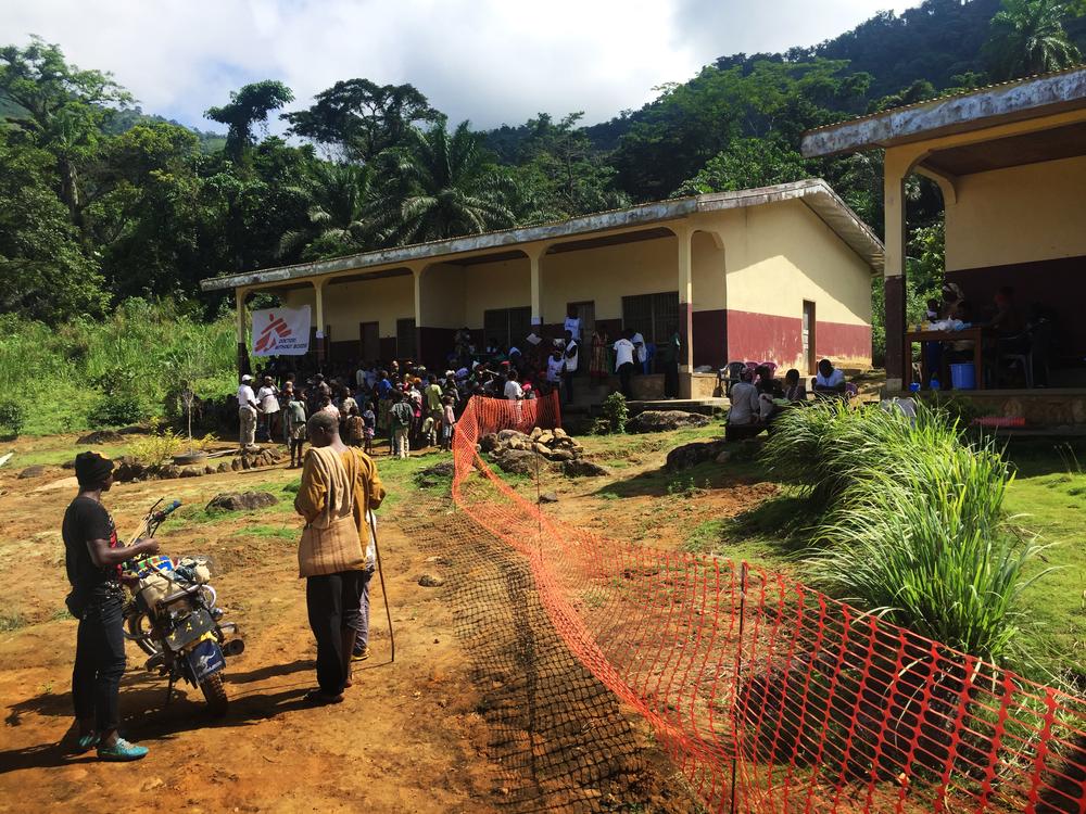 People in Menka, in the North-West Region of Cameroon, wait to receive medical assistance from MSF. In an area which violence and displacement has interrupted access to healthcare, MSF teams are distributing essential non-food items such as soap and mosqu