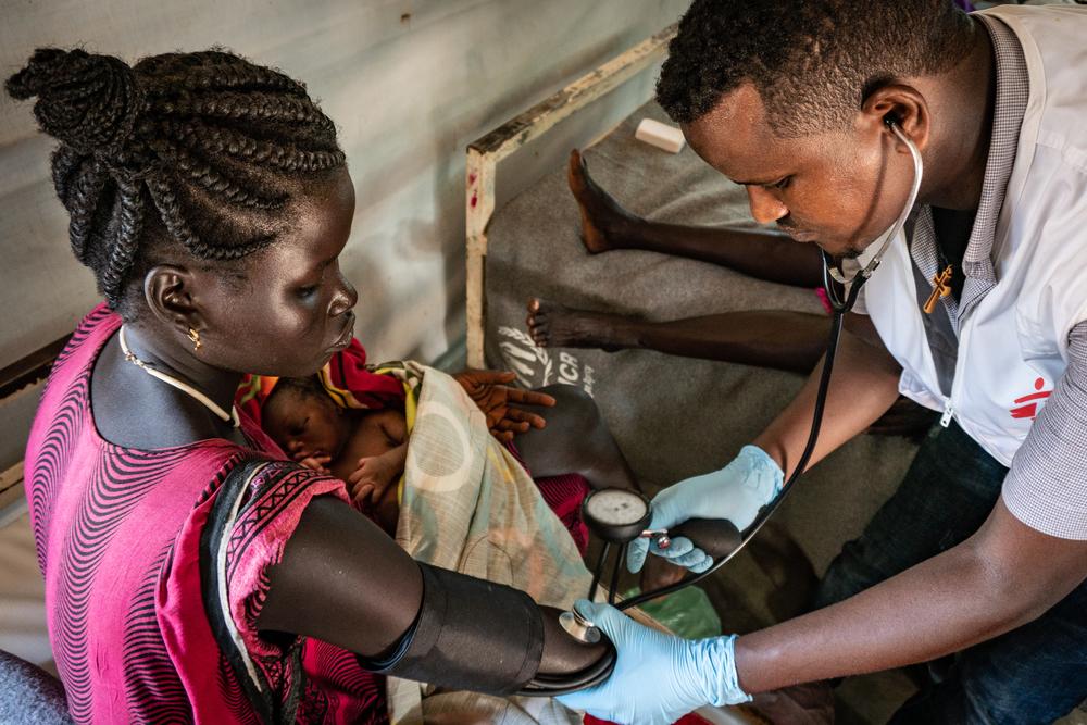 MSF staff cares for a new mother at the maternity in Gambella. 2019 