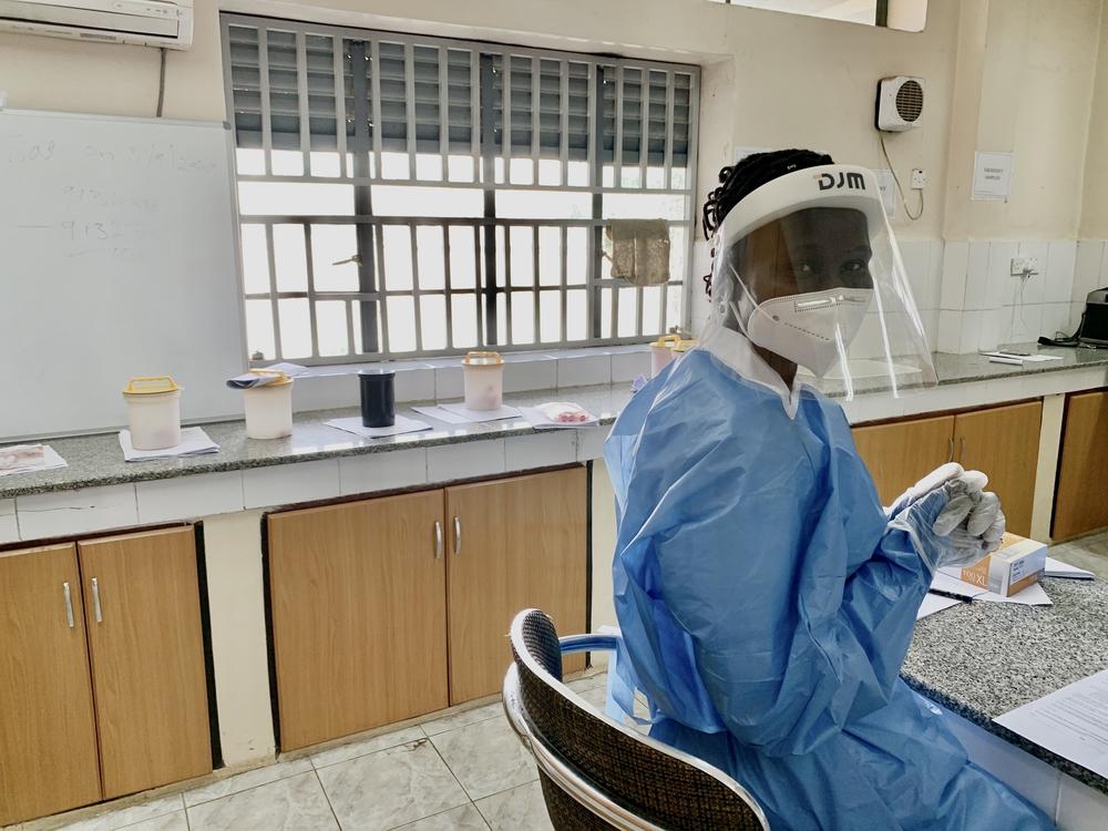 biotechnologist Rebecca Achok, registers and codes samples of COVID-19 suspected cases