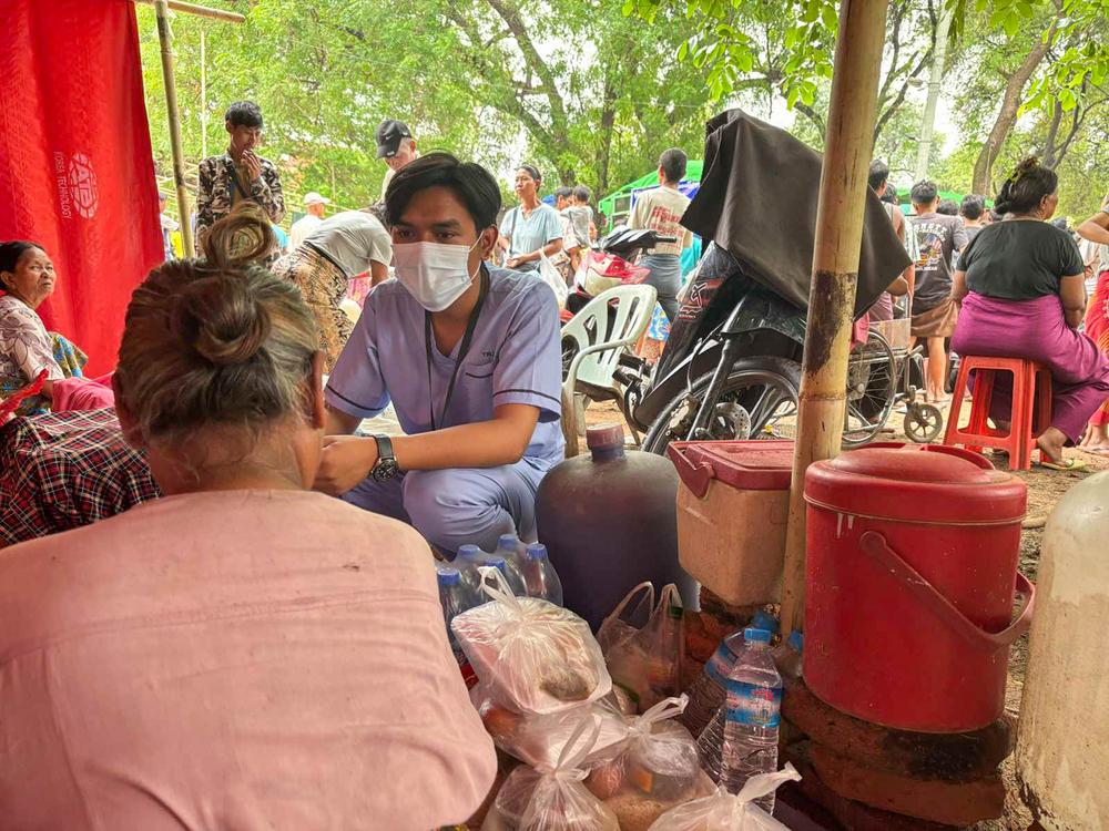 Voluteers provided psycological first aid to beneficiaries at through mobile clinics and in the temporary camp, in Chan Mya Thar Si Township, Mandalay