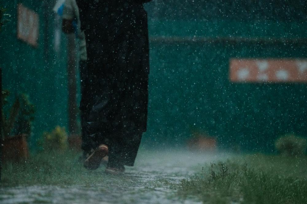 A Rohingya woman walks into MSF’s Balukhali clinic in Kutapalong refugee camp, Bangaldesh, June 2025.