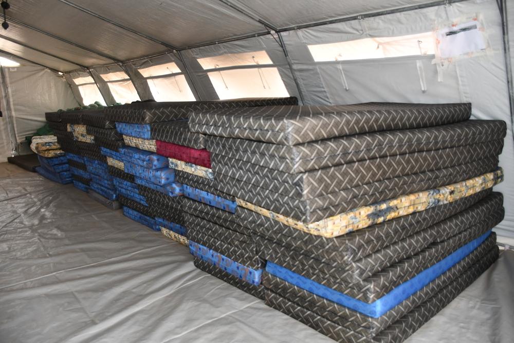 Mattresses used as beds for Malawian nationals staying at the Nyamapanda Reception Centre. The border closes at 8 p.m., and buses transporting returnees sometimes arrive late in the evening.