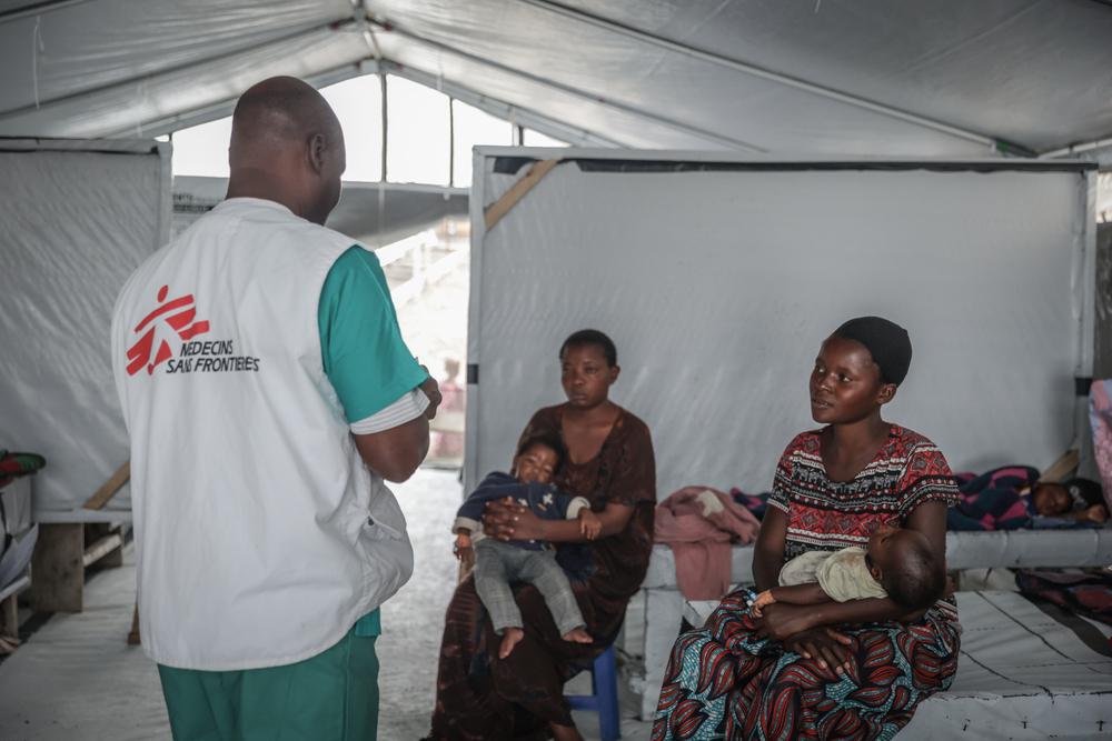Emmanuel Kabwenge, a nurse at a MSF-supported cholera treatment center, visits cholera patients in a quarantine block at the Buhimba hospital centre in Goma.